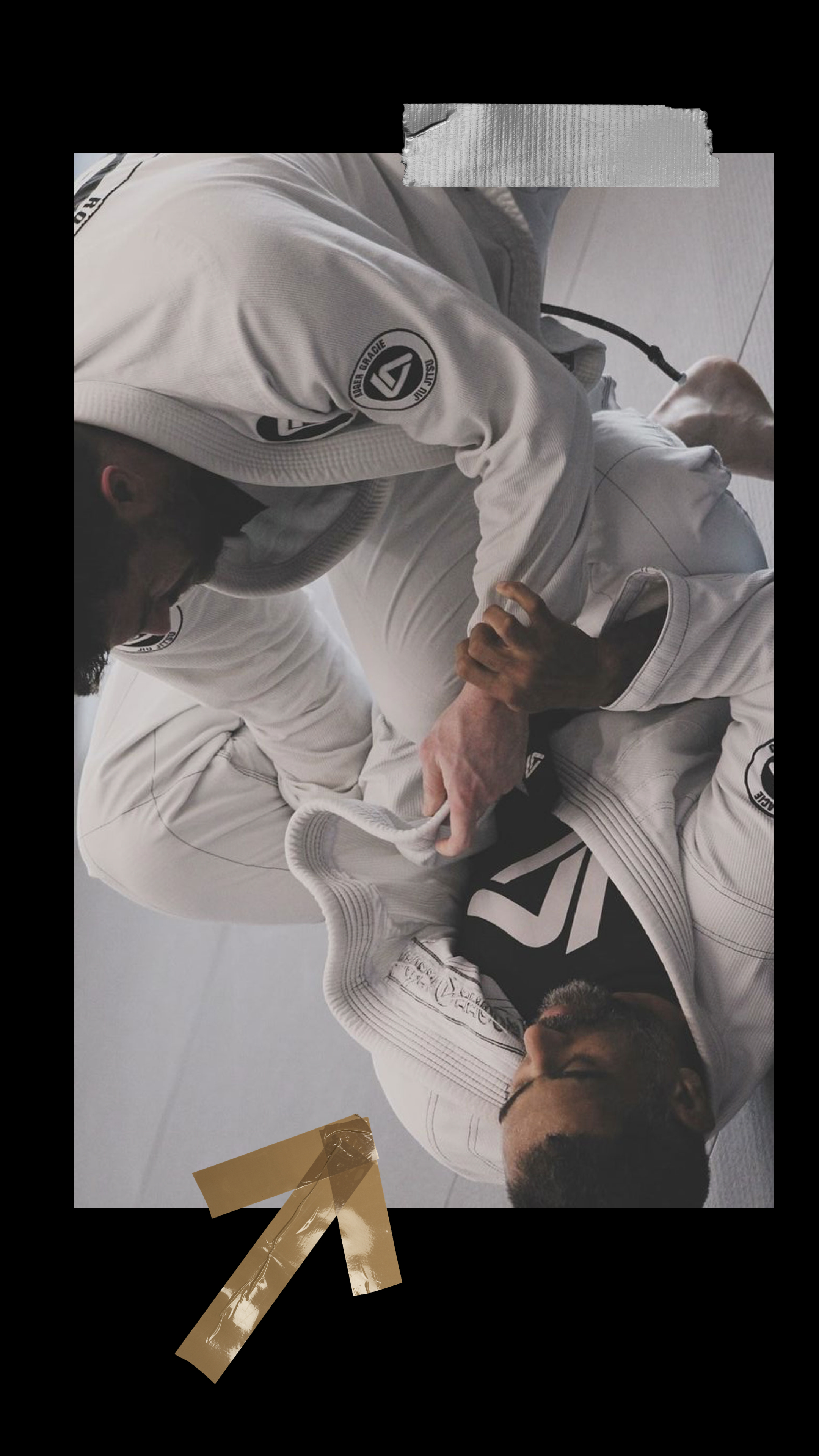 Adult students training a technique at Roger Gracie Academy Frisco