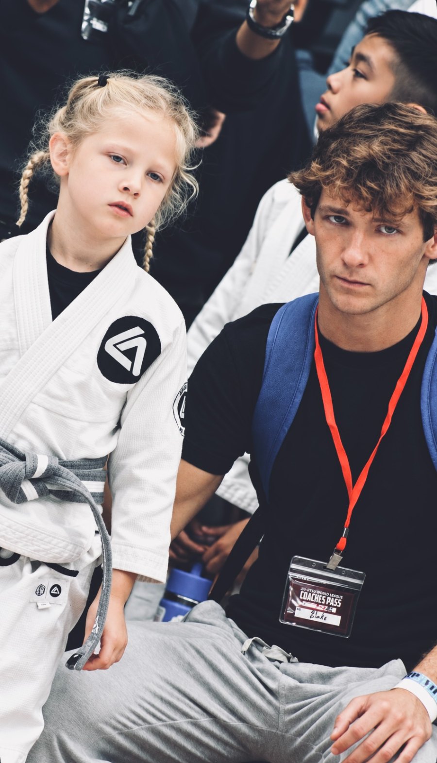 Coach Blade Steelman cornering a young RGA Frisco student at a Jiu Jitsu World League tournament